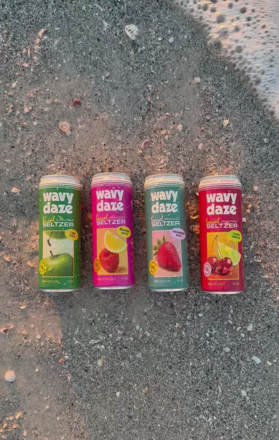 Video of wave crashing into all four Wavy Daze cans on the beach 